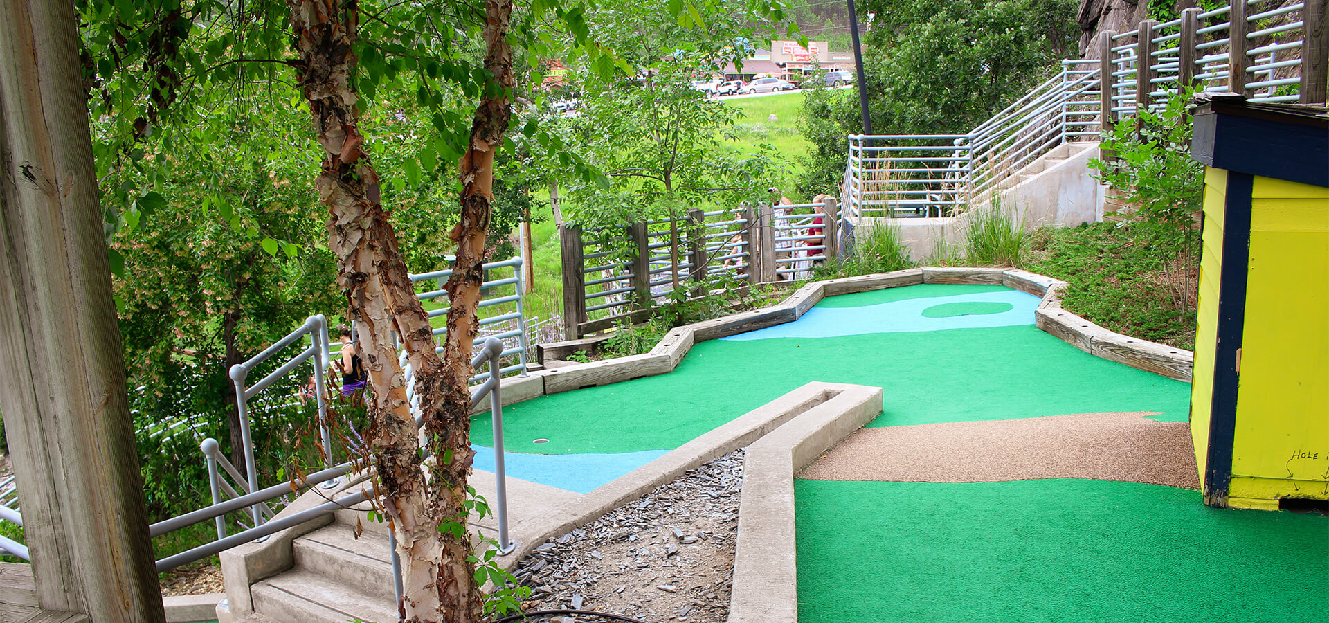 Exterior photo of one of the golf greens at Holy Terror Mini Golf.